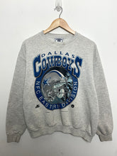 Vintage 1997 NFL Football Dallas Cowboys NFC East Spell Out Helmet Graphic Crewneck Sweatshirt (fits adult size Medium)
