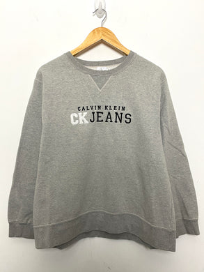 Vintage 1990s Calvin Klein Jeans Spell Out Graphic Crewneck Sweatshirt (size adult Medium)