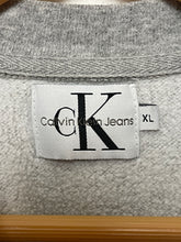 Vintage 1990s Calvin Klein Jeans Spell Out Striped Motion Graphic Crewneck Sweatshirt (size adult XL)