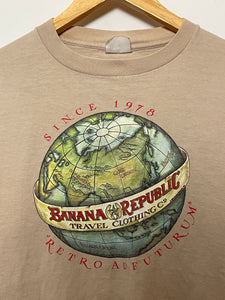 Vintage 1990s Banana Republic Travel Clothing Co "Retro Ad Futurum" Spell Out Globe Graphic Beige Long Sleeve Tee Shirt (size adult Medium)